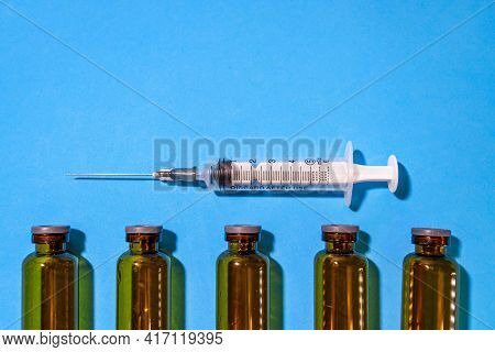 Used Vials Of Drugs Are On The Table