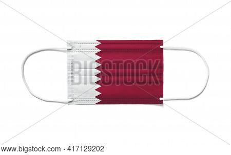 Flag Of Qatar On A Disposable Surgical Mask. White Background Isolated
