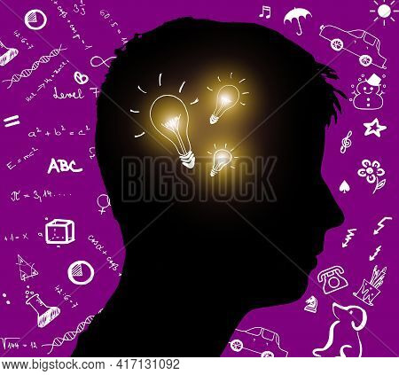 Silhouette Of A Man With A Light Bulbs. Concept For Questions And Knowledge. The Right And Left Hemi