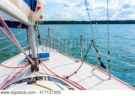 View From A Main Deck Of Sailboat On A Lake. Summer Vacations, Cruise, Recreation, Sport, Regatta, L