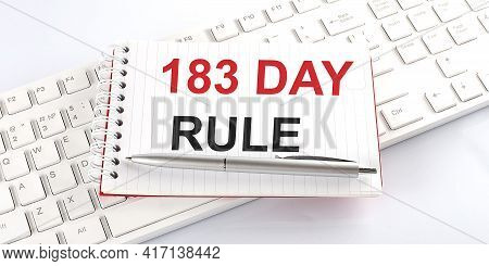 183 Day Rule On Keyboard On The White Background