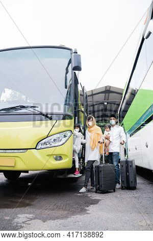Muslim Holiday Trip Riding A Bus Together With Family