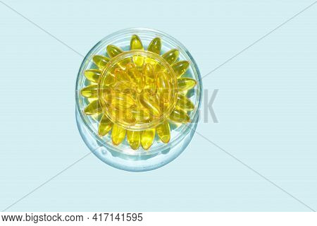 Omega3 Gel Capsule. Sun Shadow. Yellow Vitamin. Health Eating. Dietology Drug. Fish Oil Supplement. 