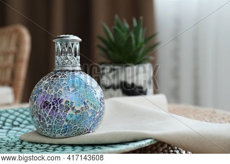 Stylish Catalytic Lamp On Wicker Stand Indoors, Space For Text. Cozy Interior