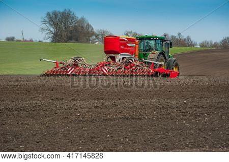 Baykivtsi, Ternopol Region, Ukraine - April 10, 2021: Sowing Campaign In Ukraine, Tractor Working On