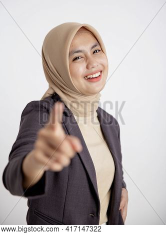 Young Businesswoman Cheerful Pointing At The Camera Office Work Concept
