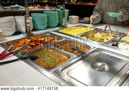 Side Dishes On The Serving Line, Self-service Restaurant. Steamed Vegetables, Rice, Buckwheat, Potat