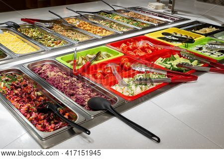 Serving Vegetables And Salads, Self-service Restaurant. Vegetables Tomatoes, Cucumbers, Marinade. Co