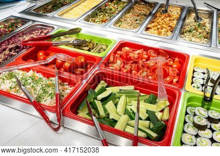 Serving Vegetables And Salads, Self-service Restaurant. Vegetables Tomatoes, Cucumbers, Marinade. Co