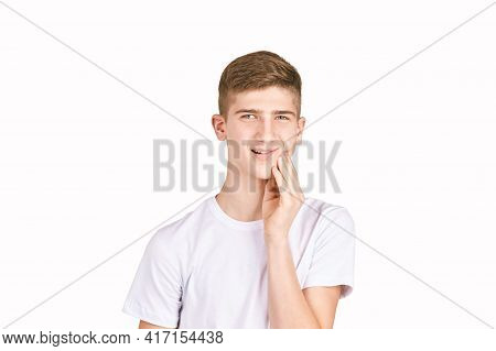 Children Portrait In White T-shirt. Studio Isolated Concept. Toothache Problem. Dental Care. Bad Fac