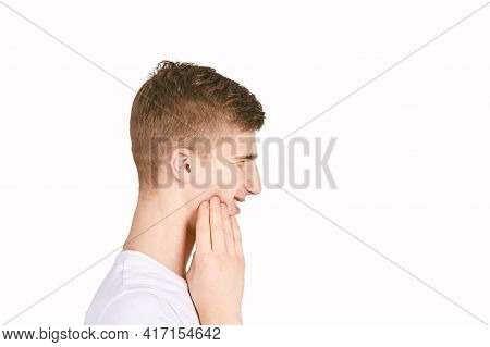 Children Portrait In White T-shirt. Studio Isolated Concept. Toothache Problem. Dental Care. Bad Fac