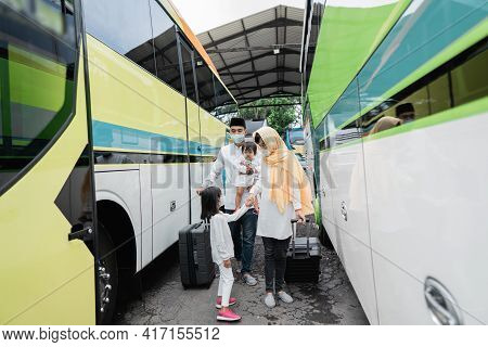 Muslim Holiday Trip Riding A Bus Together With Family