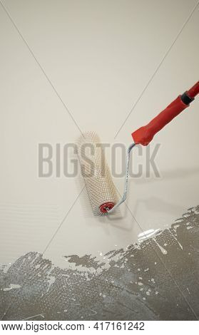 Worker Works With Epoxy Resin For Interiors