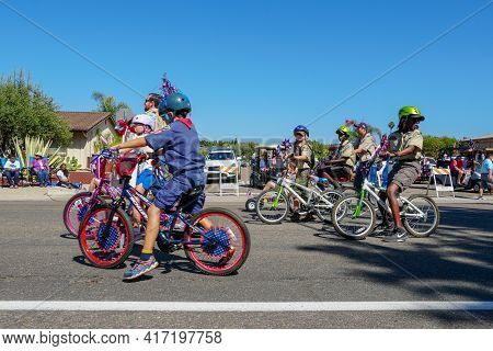 Young Kids With American Flag Parading At The 4th Of July Independence Day Parade In Rancho Bernardo