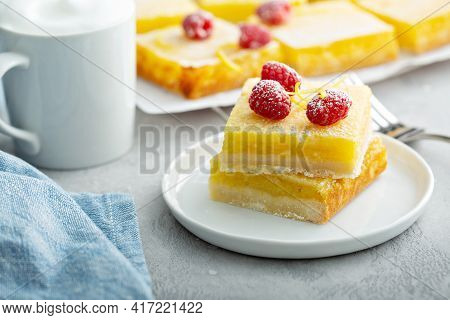 Lemon Pie Squares Topped With Rasperries, Homemade Dessert