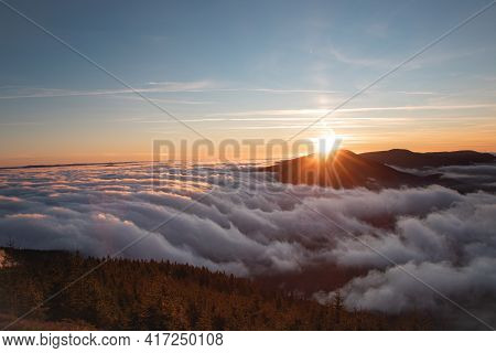 Photo Shoot Of Sunset On Lysa Hora With A View Of Smrk Mountain In Beskydy Mountains. Clouds Flow Ar
