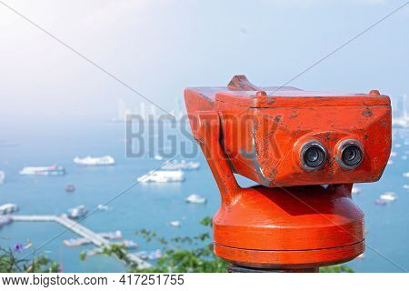 Red Tourist City Binoculars On An Resort Town In Thailand, Panorama Of The City Of Pattaya And Red B