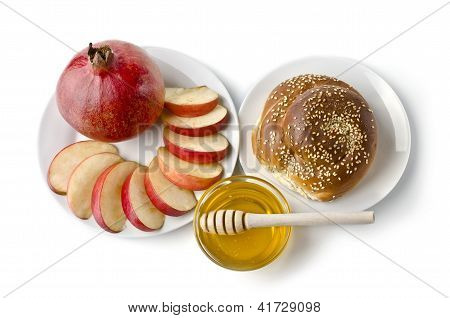นิ่ง - Challah แอปเปิ้ล ทับทิม และชามของน้ำผึ้ง