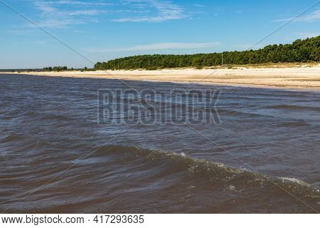 Sand And Lake With Blue Sky In Lagoa Dos Barros Lake, Osorio, Rio Grande Do Sul, Brazil