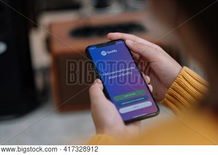 Chiang Mai , Thailand Apr 14 2021 : Apple Iphone Xs Smartphone With Spotify App On Screen.spotify Is