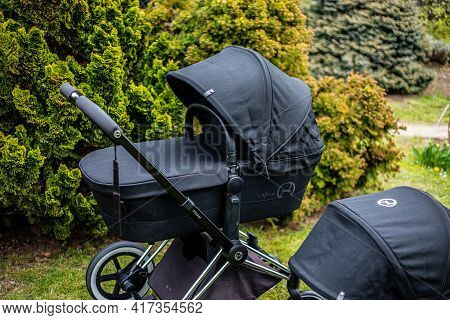 Budapest, Hungary - April 18, 2021: Cybex Priam Black Stroller Or Pram In The Park. Infant Carriage