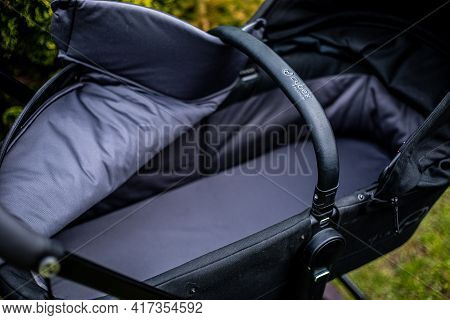 Budapest, Hungary - April 18, 2021: Cybex Priam Black Stroller Or Pram In The Park. Infant Carriage