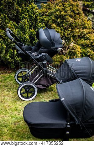 Budapest, Hungary - April 18, 2021: Cybex Priam Black Stroller Or Pram In The Park. Infant Carriage