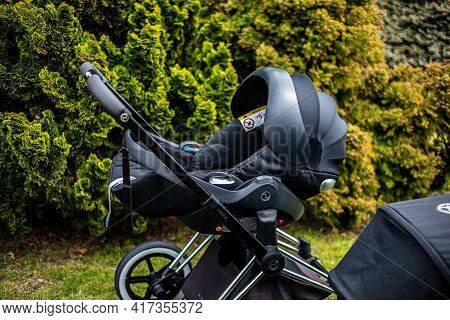 Budapest, Hungary - April 18, 2021: Cybex Priam Black Stroller Or Pram In The Park. Infant Carriage