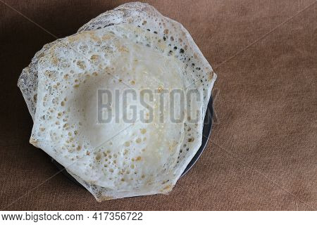 Laced Rice Crepes Or Fermented Rice Pancakes Made With Fermented Rice Batter And Coconut Milk.