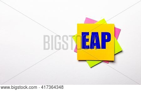 On A Light Background - Bright Multicolored Stickers With The Text Eap Employee Assistance Program. 