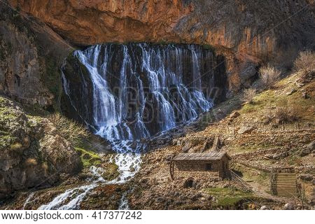 Unique Kapuzbasi Waterfalls  With Mill In Aladaglar National Park, Tuaruz Mountains Of Turkey