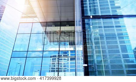 Downtown Corporate Business District Architecture. Glass Reflective Office Buildings Against Blue Sk