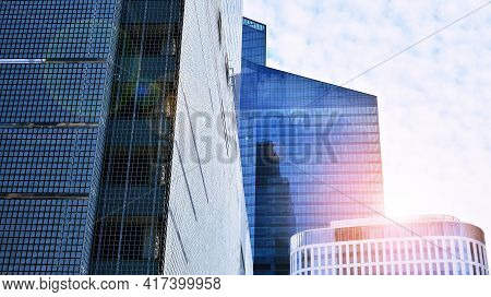 Downtown Corporate Business District Architecture. Glass Reflective Office Buildings Against Blue Sk