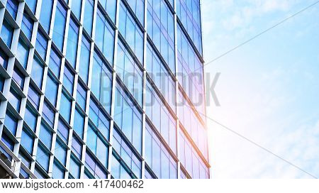 Downtown Corporate Business District Architecture. Glass Reflective Office Buildings Against Blue Sk