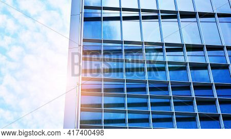 Downtown Corporate Business District Architecture. Glass Reflective Office Buildings Against Blue Sk