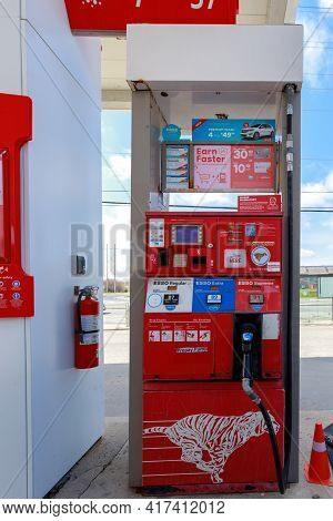 Ottawa, Ontario, Canada - April 18, 2021: A Gasoline Pump At An Esso Gas Station On Woodroofe Ave.