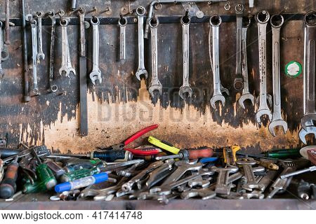 Tools Equipment On Wall Against For Fix Mechanic Garage In Workshop Inustrial, Diy, Hammer, Iron