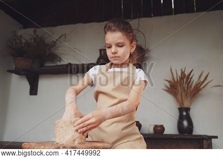 Charming Craftsman Little Girl Enjoying Pottery Art And Producti