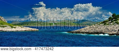 Holiday On Kornati Islands In Croatia Sailing Ship Cumulus Clouds