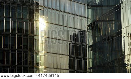 Office Buildings At Domaniewska Street. Sunlight Reflecting The Glass Windows Of The Building. The S