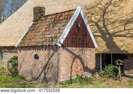 Little Brick Shed In Front Of A Historic House In Orvelte, Netherlands