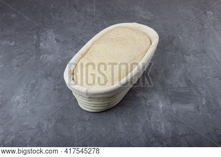 Sourdough Dough In Proofing Basket. Whole Wheat Recipe.