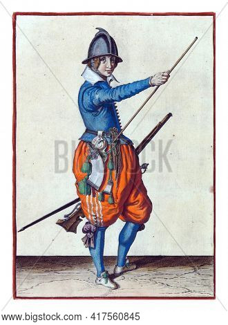 A soldier, full-length, to the right, holding a rudder  with left hand by left thigh and bringing right hand to the end of ramrod, which he rests against his right side.