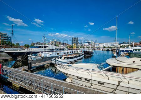 Yachts and boats moored in Willemdock in Antwerp, Belgium