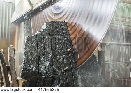 Large Industrial Cutting Machine Cuts Gray Granite Stone Into Slabs. Power Industrial Stonecutter Eq