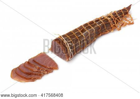 Piece of  cold smoked Albacore tuna fish and slices isolated on white background 