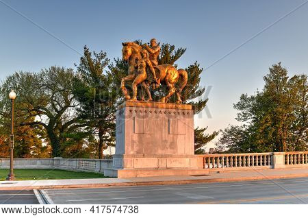 Washington, Dc - Apr 4, 2021: Arts Of War, Bronze, Fire-gilded Statue Groups On Lincoln Memorial Cir