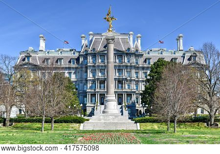 The Eisenhower Executive Office Building In Washington, Dc. In Front Is The First Division Monument,