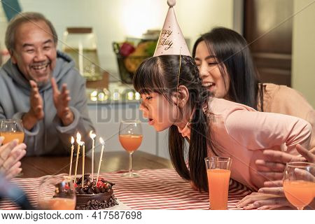 Lovely Enjoy Moment, Asian Young Family Having Birthday Party For Young Little Child Together At Hom