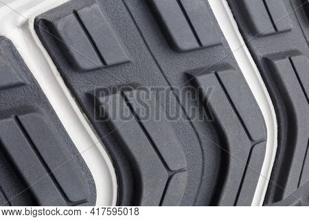 Close-up Full Frame Background Of New Generic Contemporary Sneakers Outsole With Protector Shapes